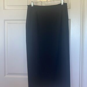 Michael Michael Kors size 6 black A -Line skirt with a front 16” slit. Skirt 32”